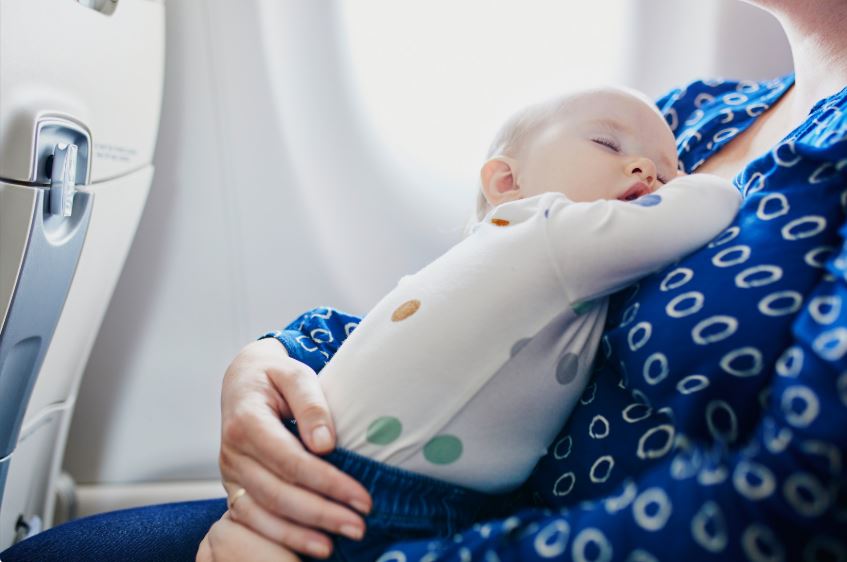 baby on a plane traveling