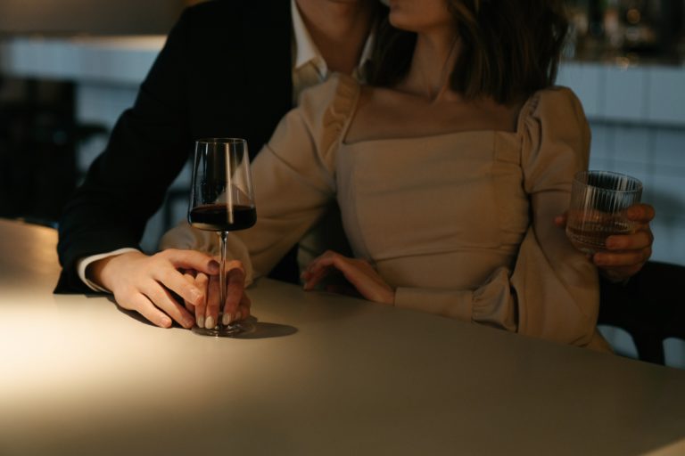 sexy couple at bar wine glasses love dating