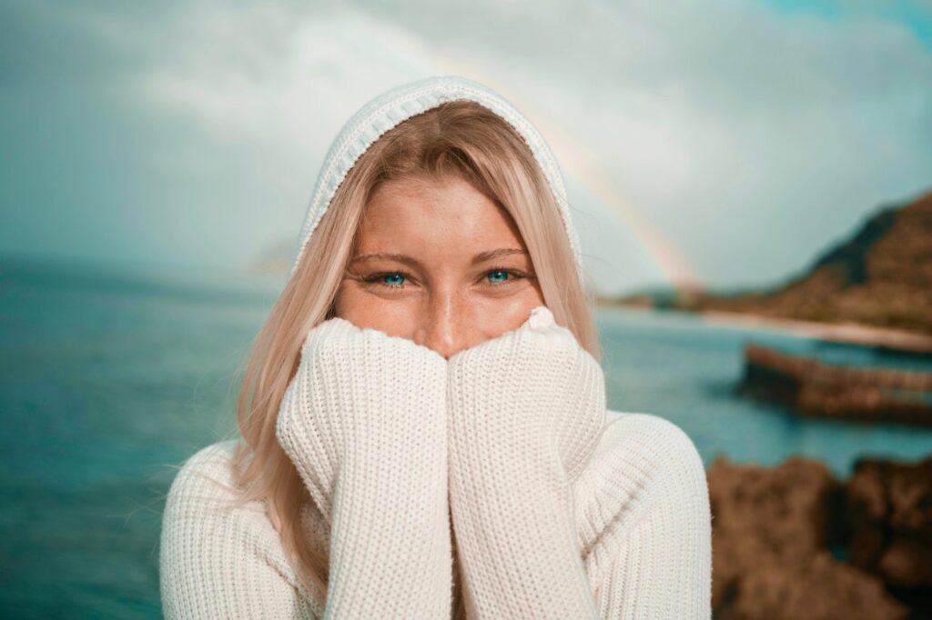 woman in a white hoodie
